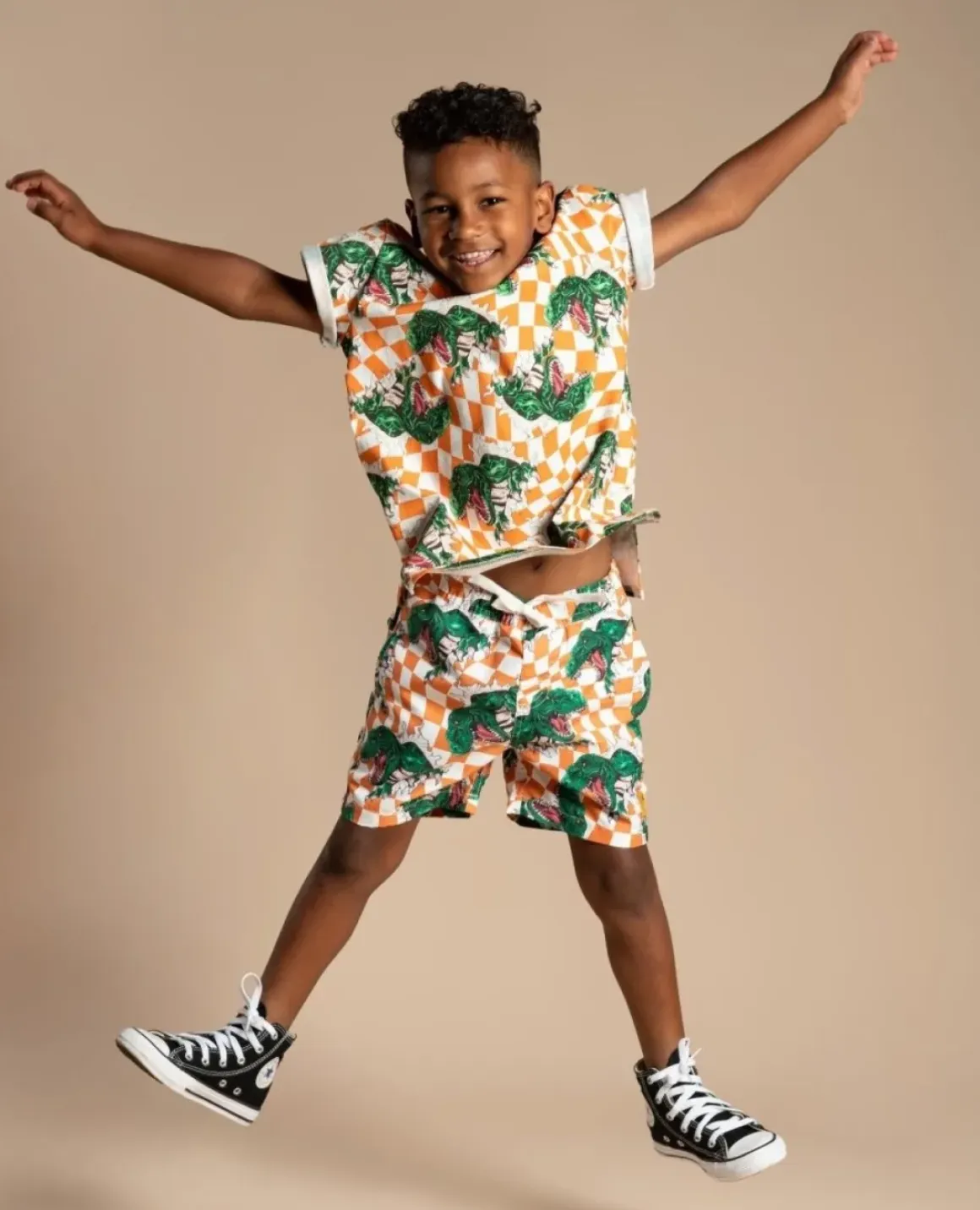 CHECKERED DINO SWIM TRUNKS